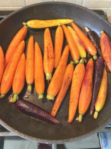Stirfrying rainbow carrots