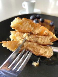 Bite of buttermilk pancakes showcasing fluffiness
