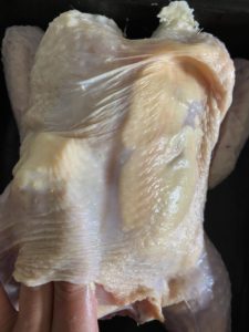 Buttering chicken breasts under skin