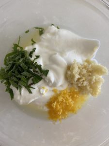 Yoghurt sauce mixed with garlic lemon zest and lemon juice with mine
