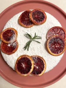 Cake with dehydrated blood orange slices.
