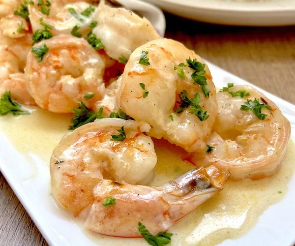 Close up picture of finished shrimps sautéed in Tahitian vanilla cream coconut sauce