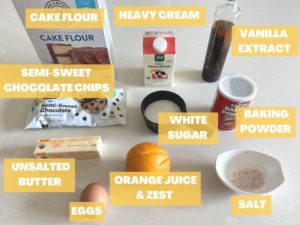 Ingredients needed to make chocolate ganache filled madeleines