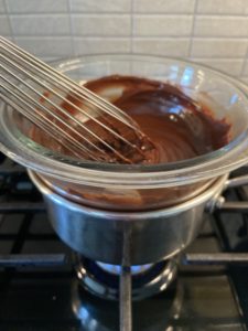 Making chocolate ganache on a double boiler.