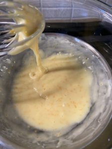 Making the white chocolate ganache with orange on a double boiler