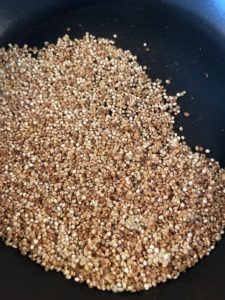 Toasting quinoa until they become golden brown