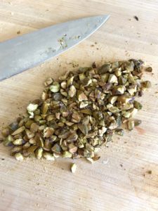 Roughly chopping pistachios