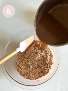 Adding wet ingredients to the granola mix