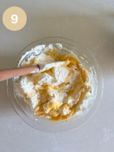 Folding in whipped cream into custard cream
